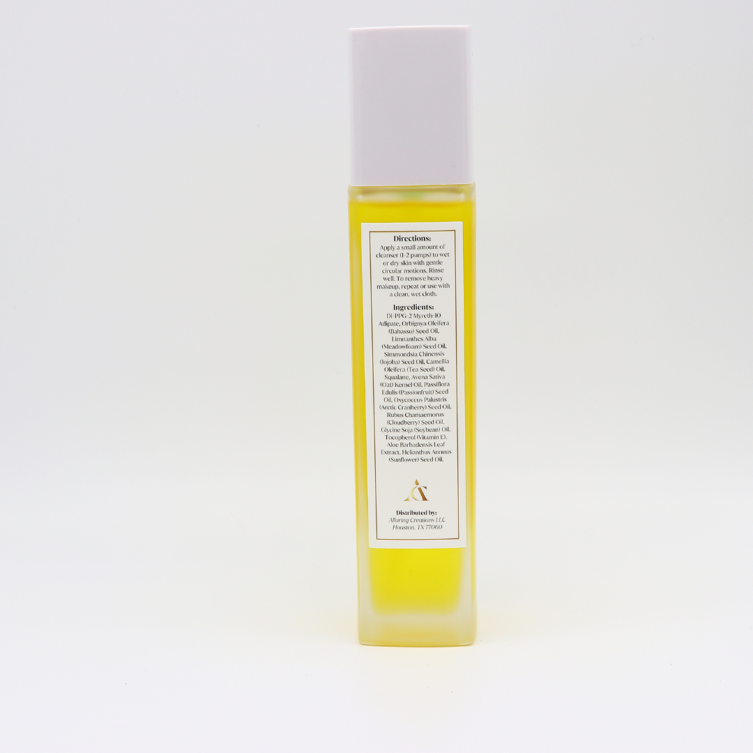 Alluring Creations bottle of best cleansing oil for makeup removal with clear label and yellow liquid